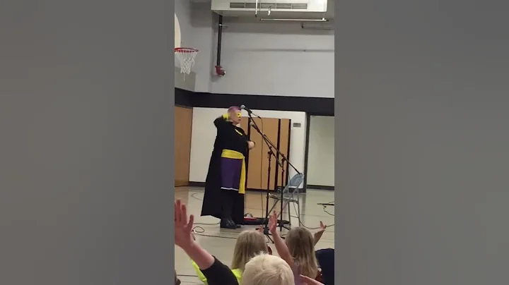 Super Reader visits PEM K-3 Graders