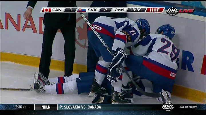 Anthony Camara hits Patrik Luza at the WJC 12/28/12