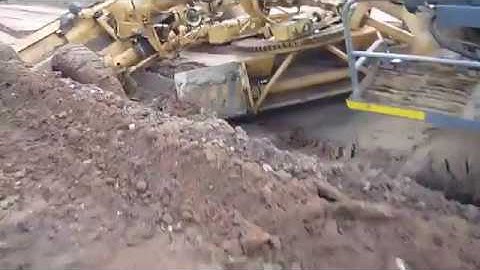 OPERATOR SKILL, GRADER STUCK IN MUD