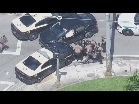 Witness says chase suspect nearly hit her car in northwest Miami-Dade