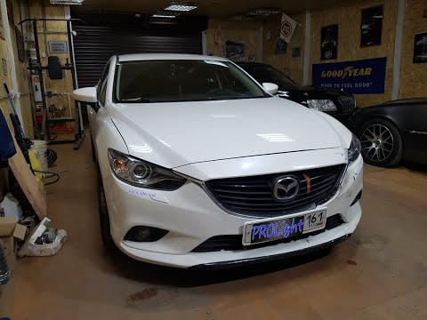 Mazda 6. Замена линз на биксеноновые линзы Hella 3R Premium с сохранением функции адаптива.