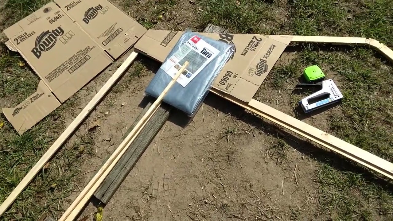 part 2 of building the cardboard tarp storage shed barn with a HART TOOL staple gun - for my ebay