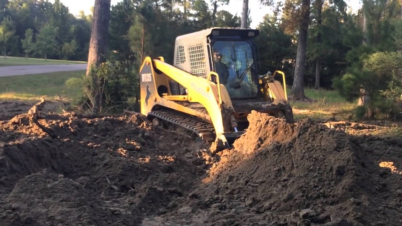 Track Loader Pushing the last of 1000 yards
