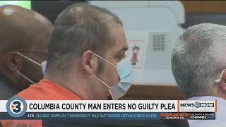 Man accused in random Columbia Co. home invasion, murder stands mute in court