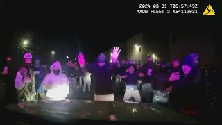 Dashcam video of people climbing on top of police cruiser in Virginia