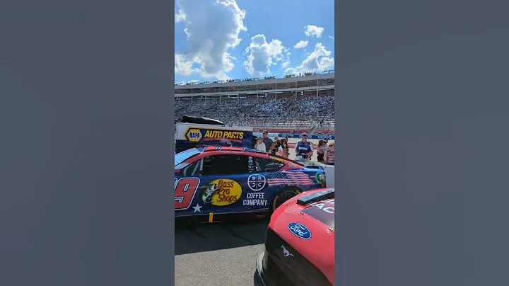 Walking the grid at the Charlotte Motor Speedway. ...