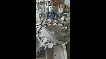 Automatic bottle cap two foil liners inserting machine