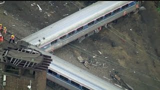 Distracted engineer blamed in deadly Amtrak wreck
