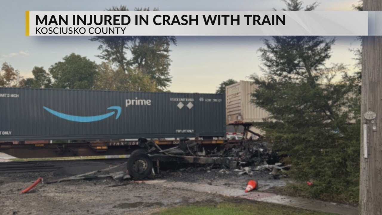 Semi driver flown to hospital after fiery train crash - YouTube