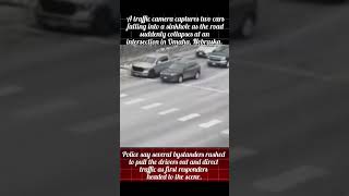 PAVEMENT PLUNGE: Traffic camera captures two cars falling into sinkhole #usnews #breakingnews