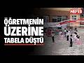 Öğretmenin üzerine tabela düştü