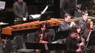 Negative Split for alto saxophone soloist and concert band by Roshanne Etezady