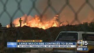 Mulch fire continues to burn in north Phoenix