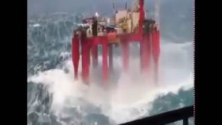 Offshore oil rig dealing with massive waves!