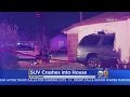 SUV Slams Into Fontana Home, 2 Hurt