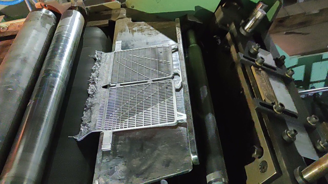 बैटरी कास्टिंग ग्रिड प्लेट battery plate casting plate machine auto