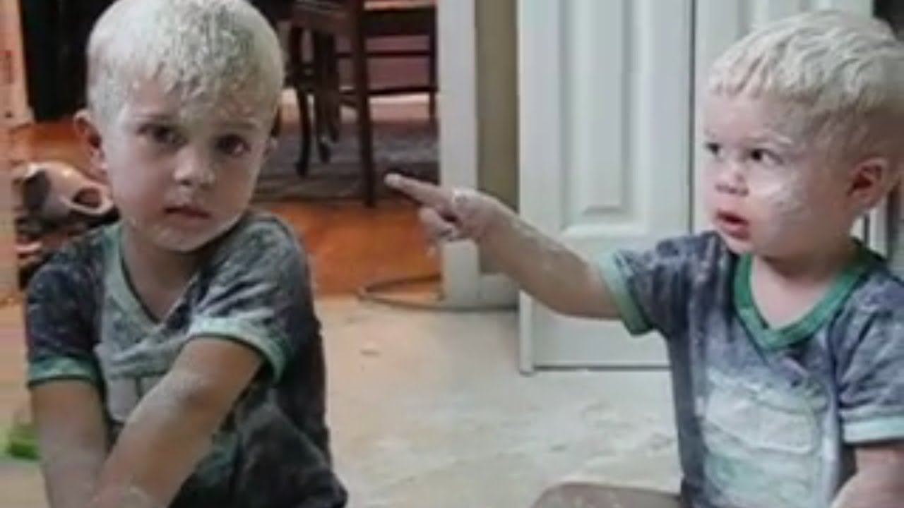 Cute Little Boy Caught Covering Brother in Flour