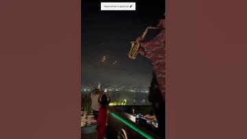 Lebanese Musician Plays Saxophone During Iranian Missile Attack on Israel