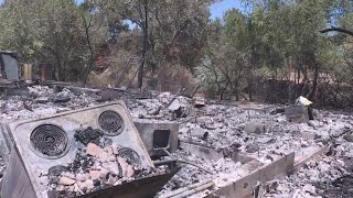 Fast-moving brush fire destroys homes in Moab