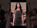 ​Mariacarla Boscono defines timeless elegance on the Ferrari runway, a true supermodel energy.