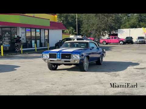 Cutlass convertible on a set of Rucci wheels