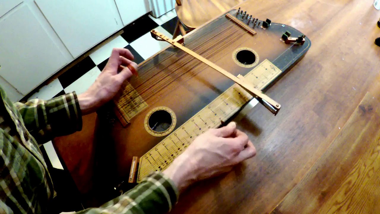 Playing The Tremoloa (ukelin with slide bar) - On Top of Old Smokey ...