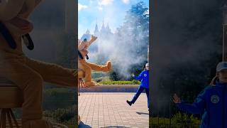 Disneyland Paris, What's going on here Pluto. Get into the groove! Disney Stars on Parade