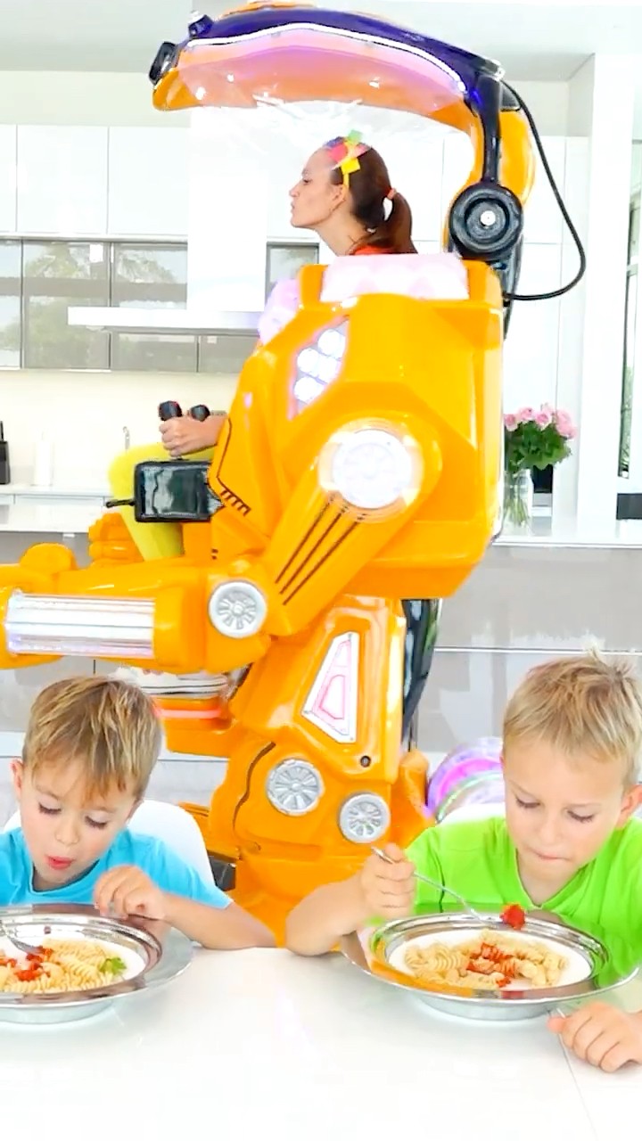 Vlad and Niki have lunch with a robot