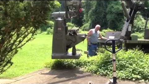 Bridgeport mill on the crane