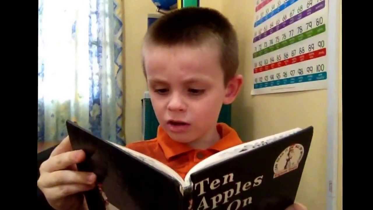 Jayden reads Ten Apples Up on Top