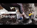 Barefoot cutting wood mixing mud  making charcoal