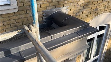 Lead Capping/Shelf Detail And Vertically Stepped Flashings To Stone Portico