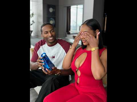 Tre surprises Ms. Johnson with a new bottle of perfume!