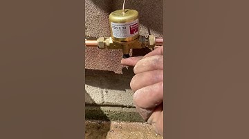 How to reset a tripped fire valve on an oil line.