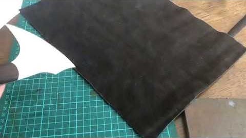 Leather Roll Japanese Paint Brush Holder with tooled Naruto emblem.