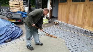 Applying Flowpoint Rapid Setting Grout to Granite Setts