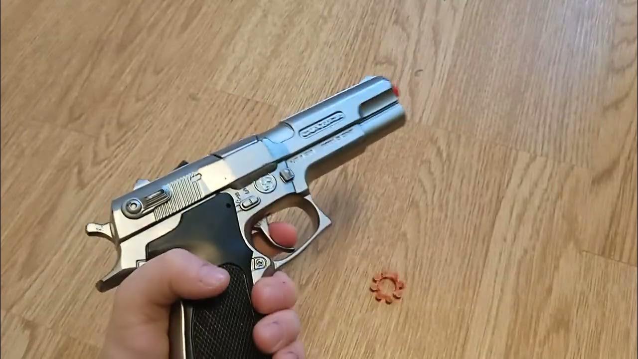 обзор пистолета с пистонами из детского мира - YouTube