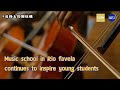 Music school in Rio favela continues to inspire young students