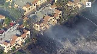Wildfires threaten homes in Santa Clarita, California