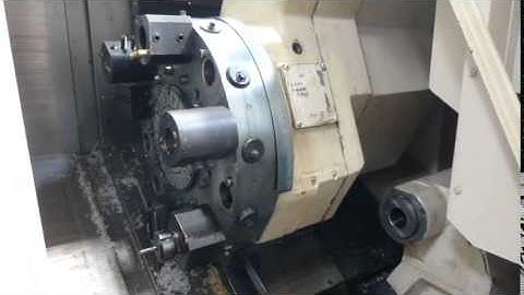 10" chuck Okuma Model LB-15M Mark II 3-Axis CNC Lathe (1995)