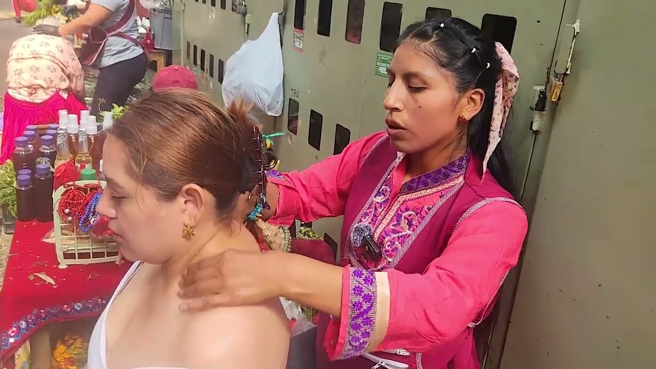 Traditional spiritual cleansing at the Feria Libre market