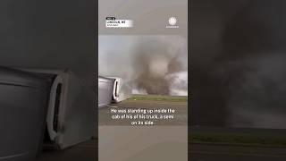 Storm Chaser Checks on Trucker Flipped by Tornado