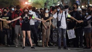 Thai police fire water cannon on protesters defying ban on rallies