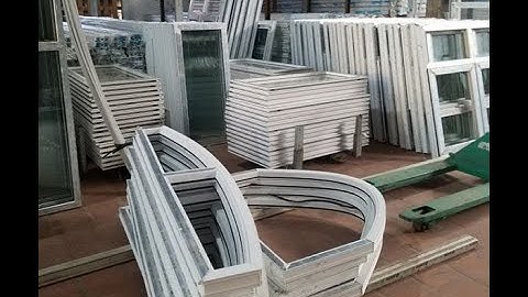 NHÀ MÁY SẢN XUẤT CỬA NHỰA LÕI THÉP TỰ ĐỘNG