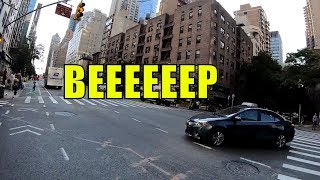 Idiot Driver in NYC Making Left Turn from Middle Lane Gets Honked at from Truck and Bicycle