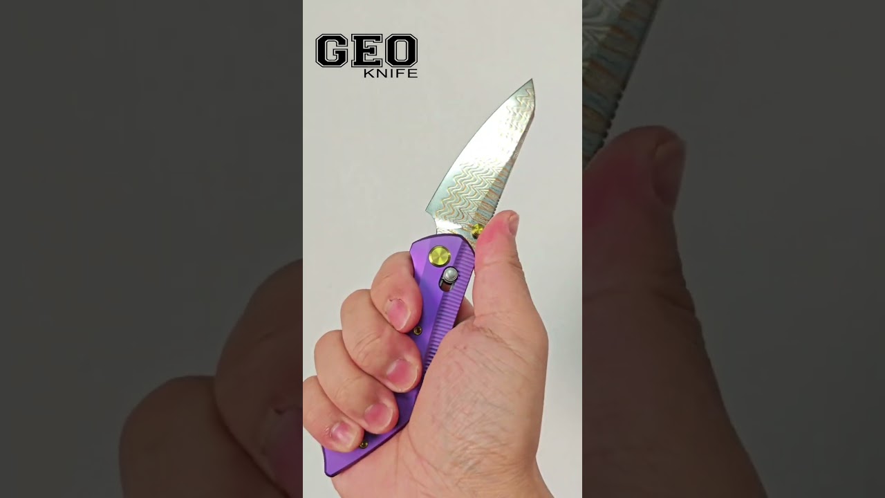 Purple Ti meets fiery Damascus. The DIVID isn&rsquo;t just a tool, it&rsquo;s an extension of your style.  #geo