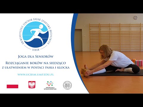 [3] Joga dla Seniorów - Rozciąganie boków na siedząco z ułatwieniem w postaci paska i klocka