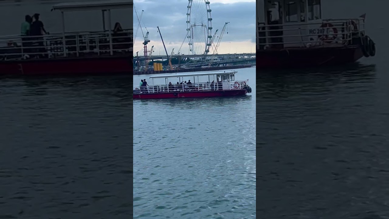 More boats cruising Singapore harbour