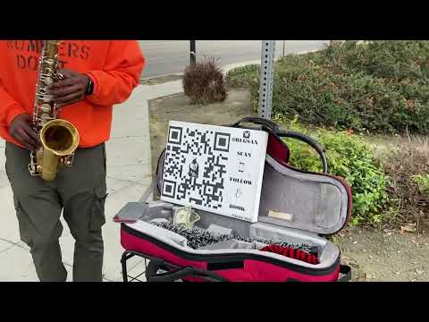 Street musician uses QR code for Gratuity Portal | Burbank Ca