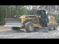 Cat 160M with Topcon 3D GPS spreading gravel part 3